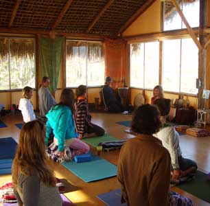 Yoga class doing the pose